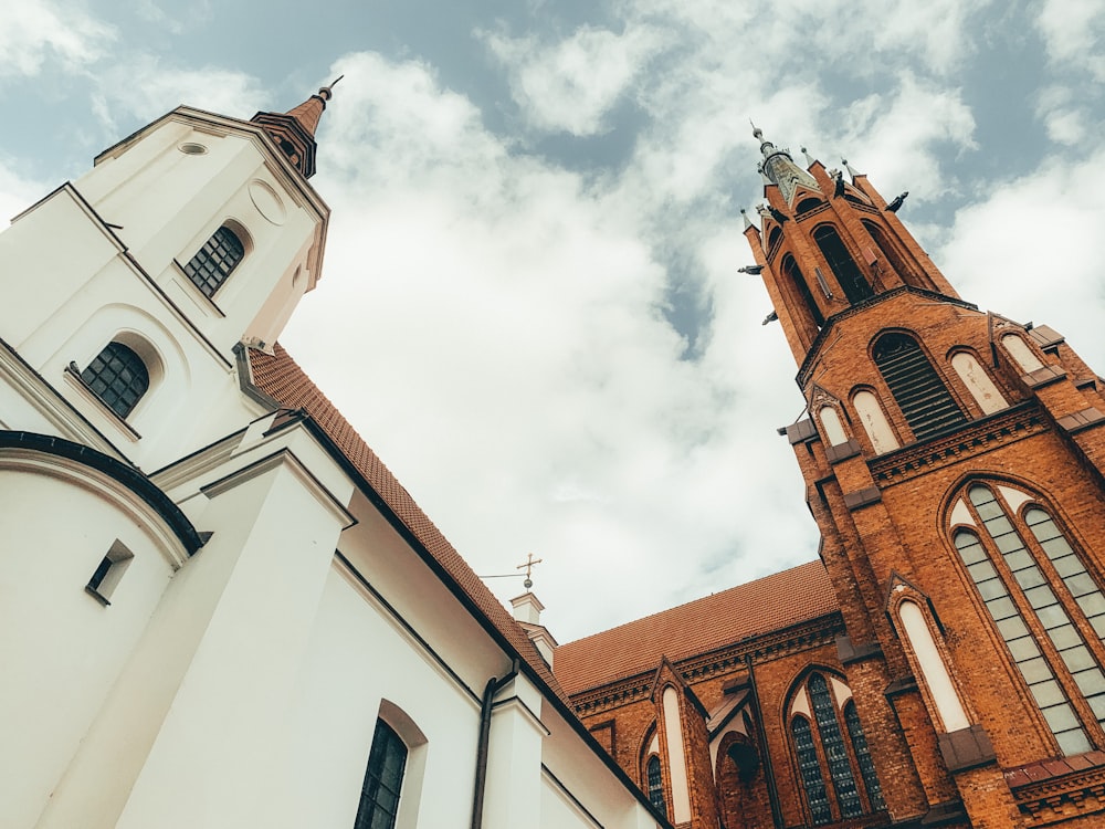 a church with a steeple and a clock tower