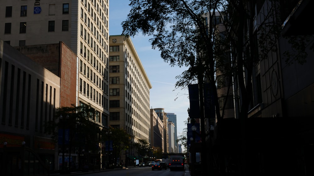 a city street with tall buildings on both sides
