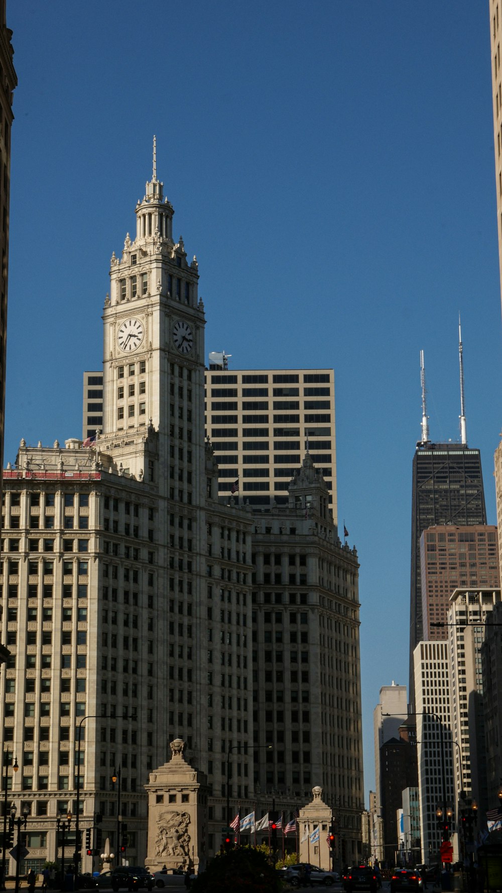 a large clock tower towering over a city