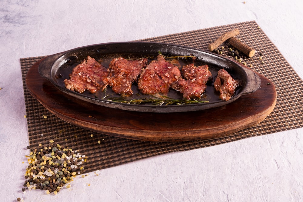 a plate of food on a mat on a table