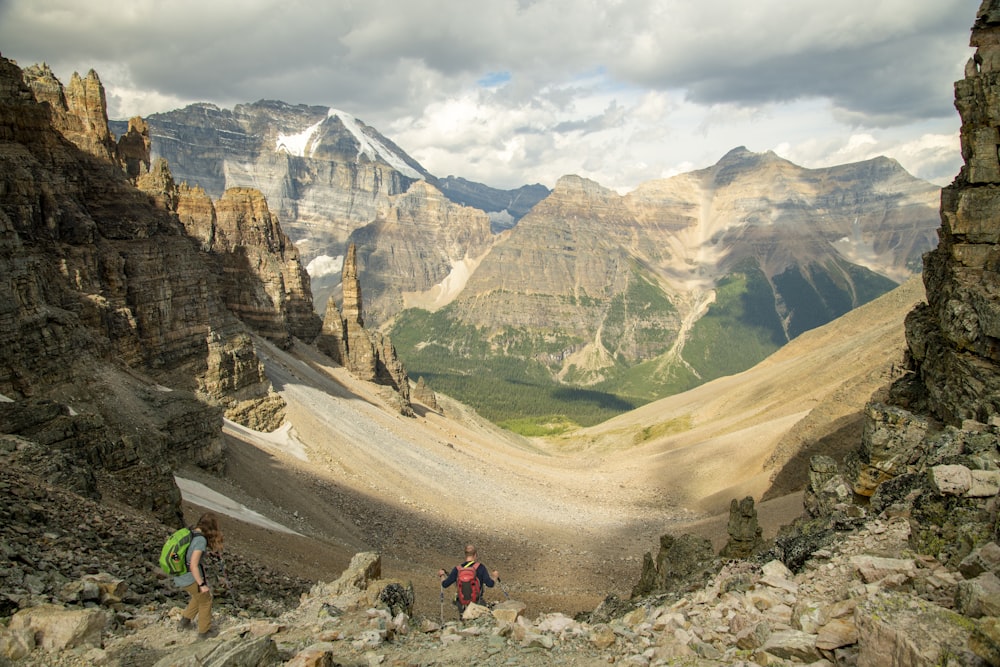 a group of people hiking up a mountain