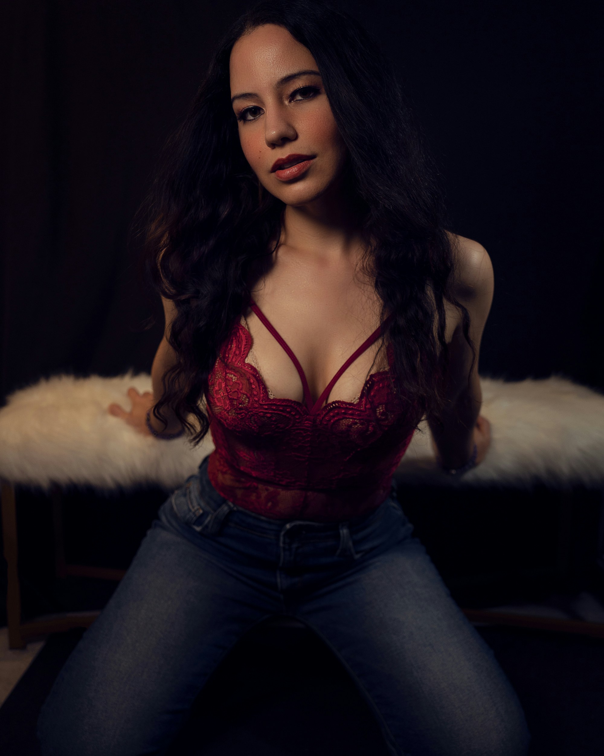 a woman in a red bra posing for a picture