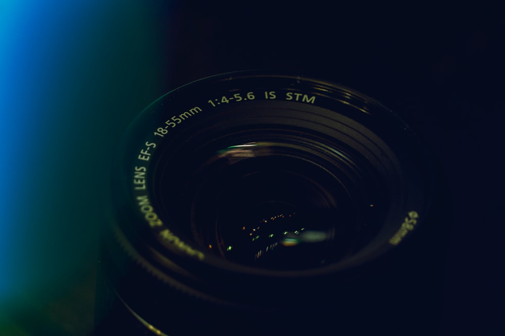 a close up of a camera lens with a blurry background