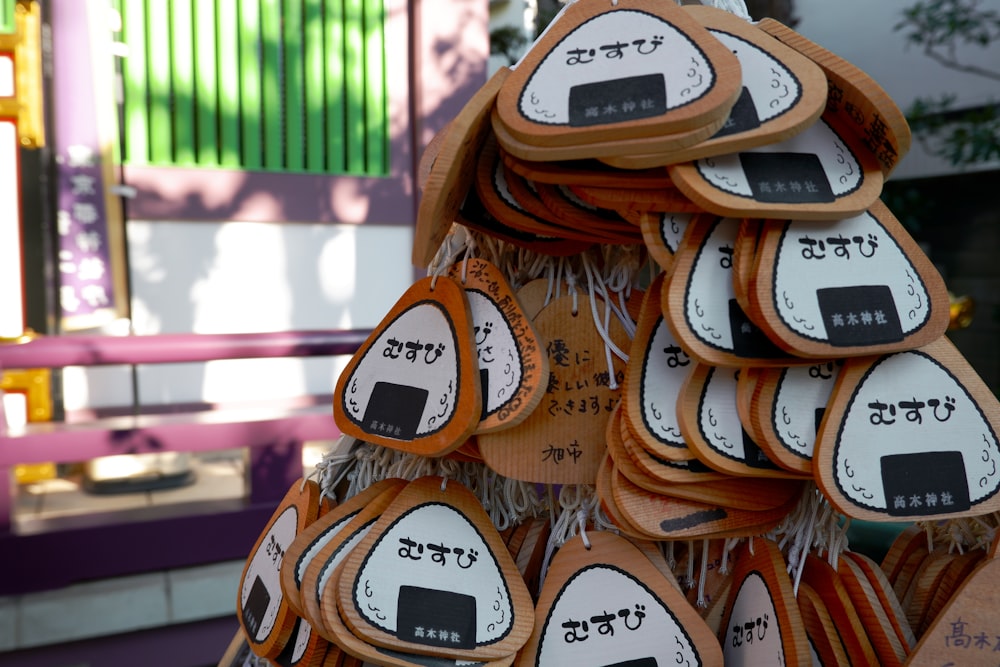 a pile of wooden pieces with asian writing on them