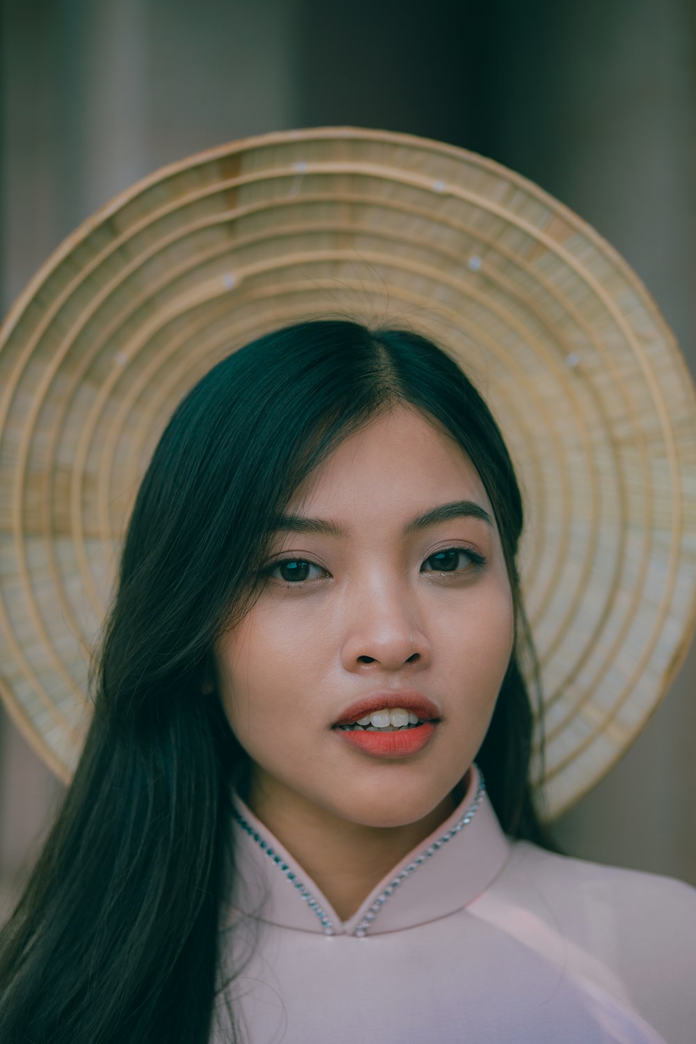 a woman with a hat on her head