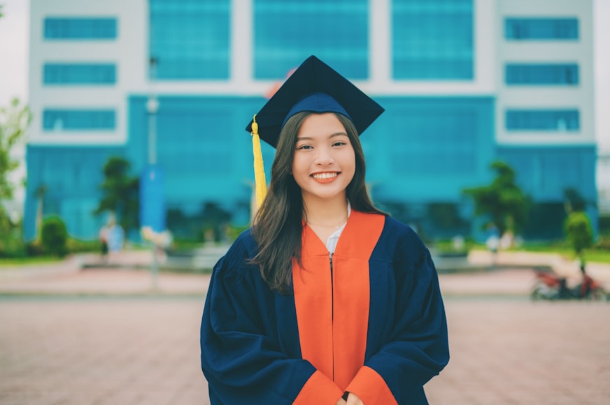 Image of a young woman wearing a cap and gown 