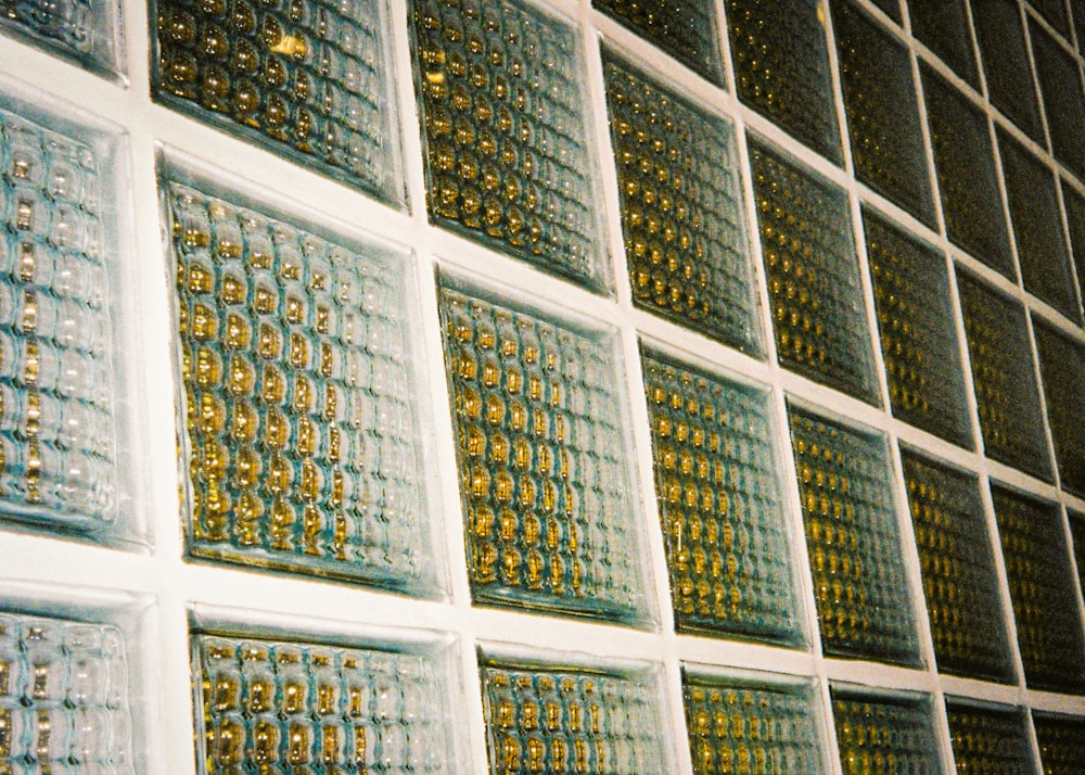 a wall of glass blocks in a room
