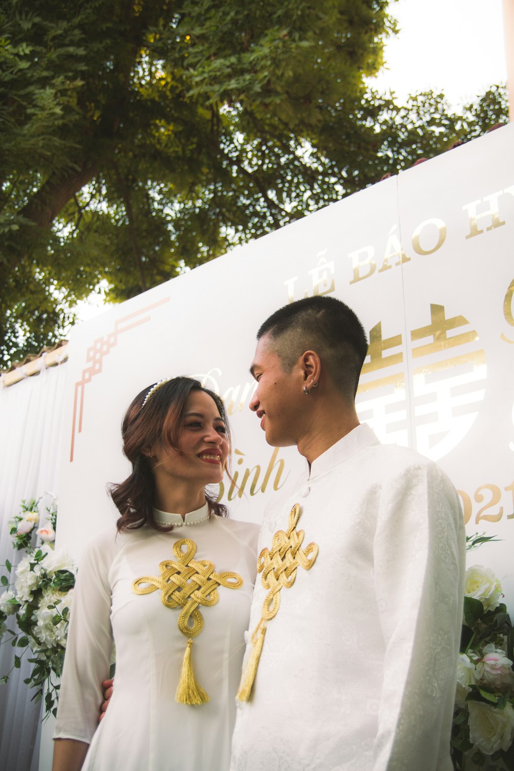 a man and a woman standing next to each other