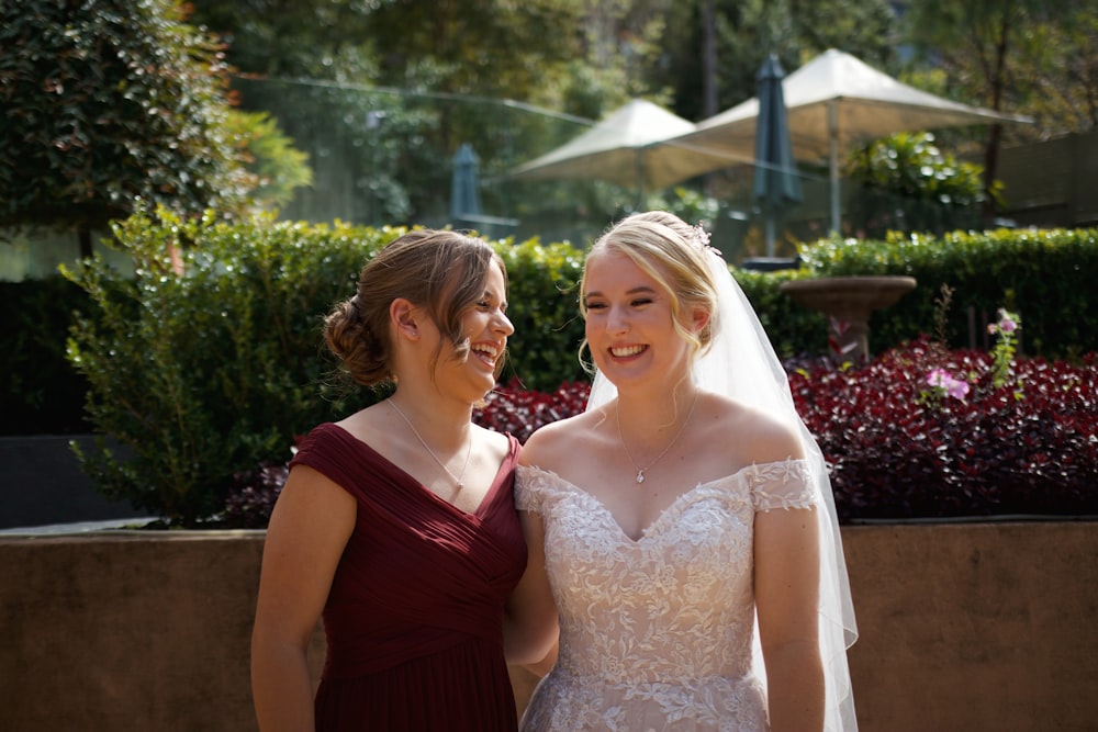 a couple of women standing next to each other