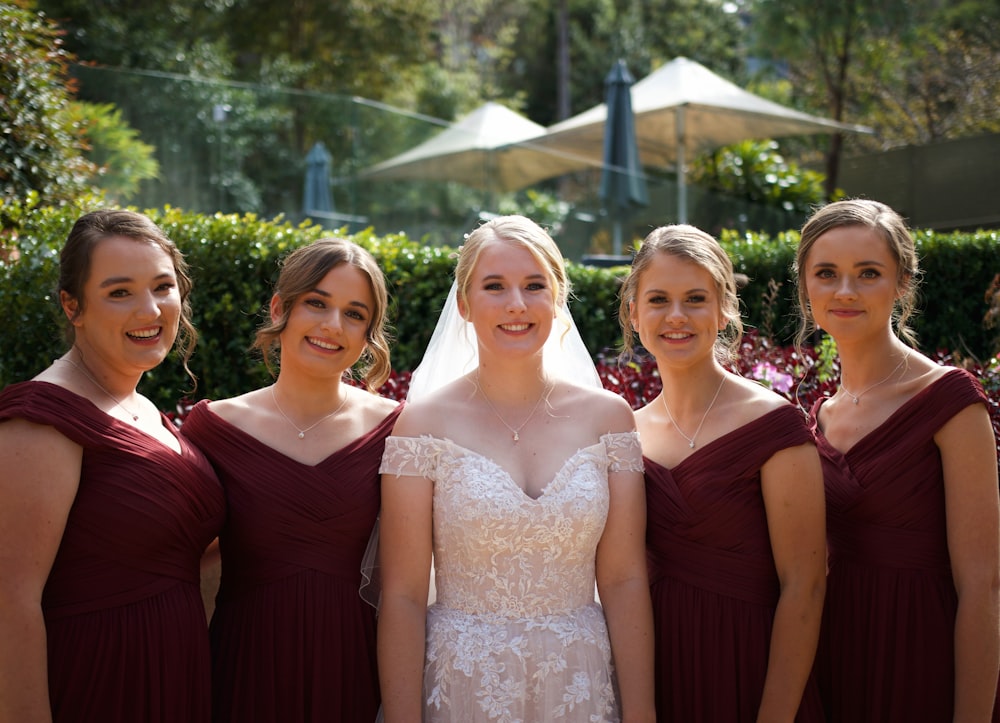 a group of women standing next to each other