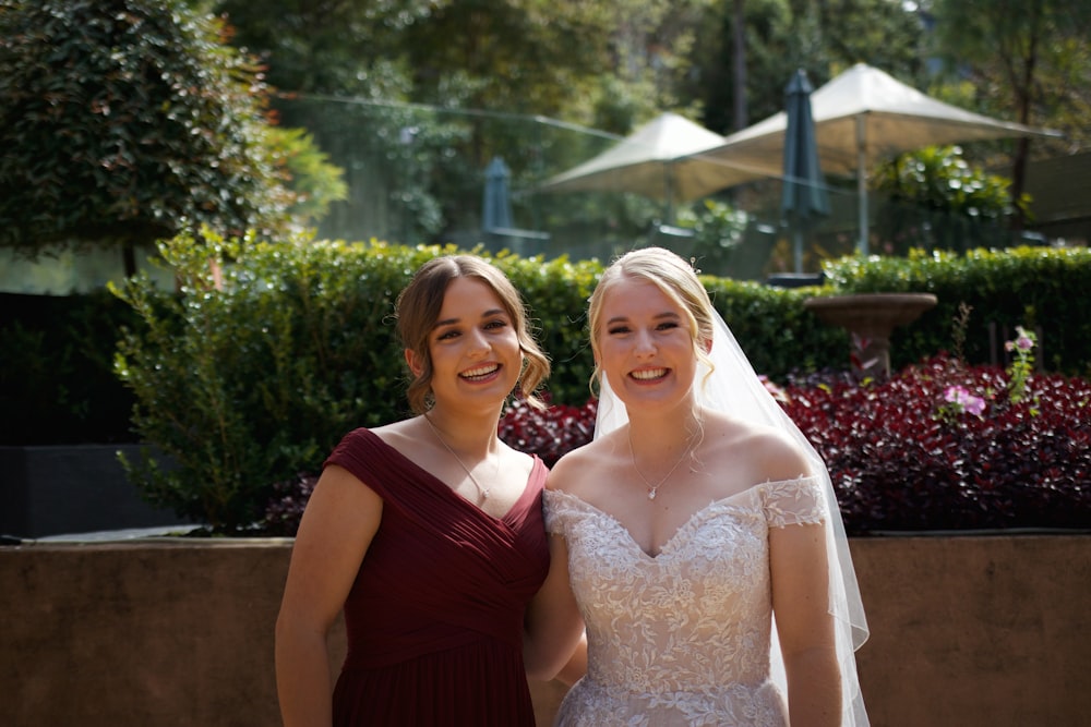 a couple of women standing next to each other