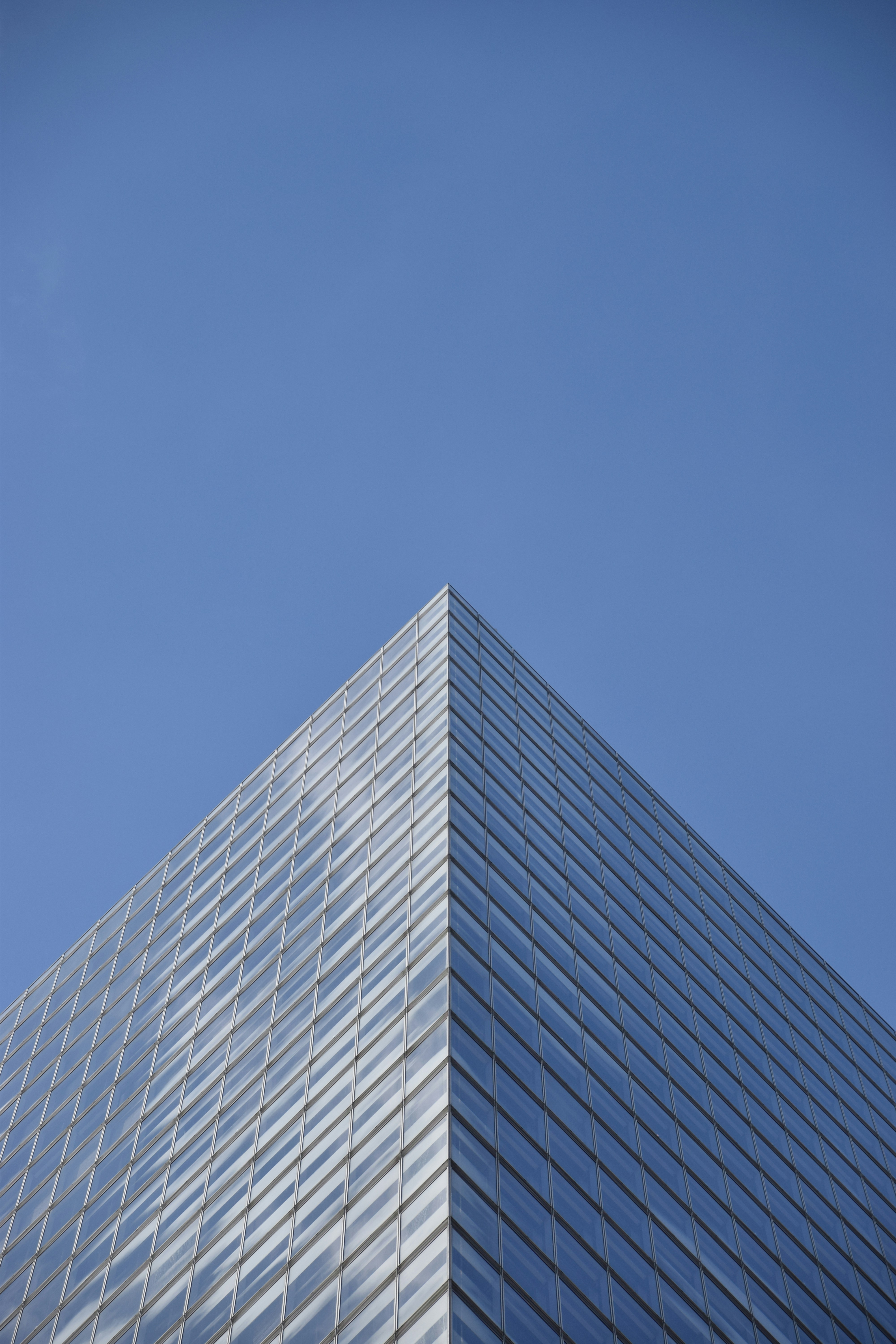 a very tall building with a sky in the background