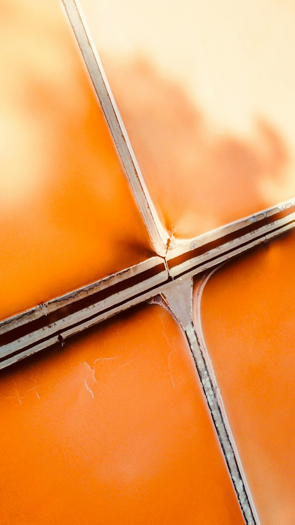 a close up of a pair of scissors cutting a piece of metal