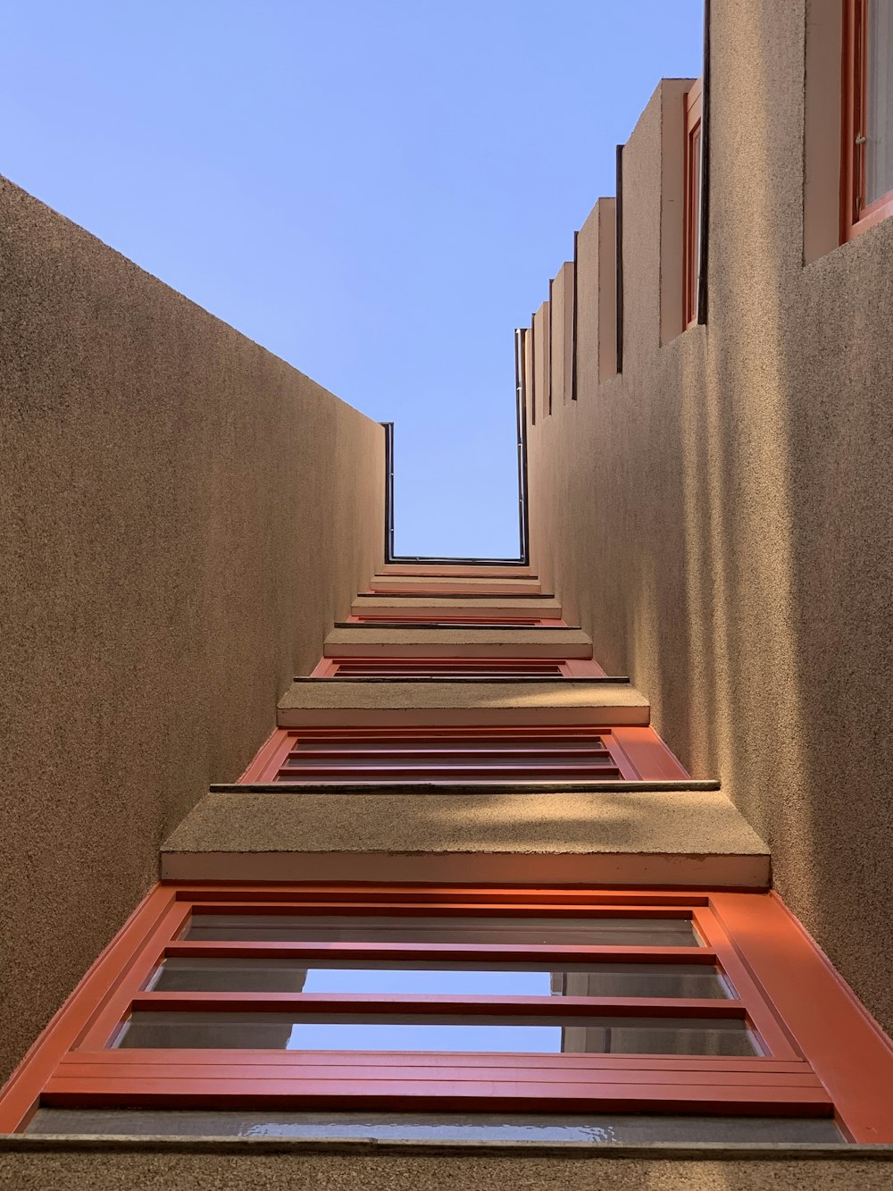 a view of a building from the bottom of the stairs