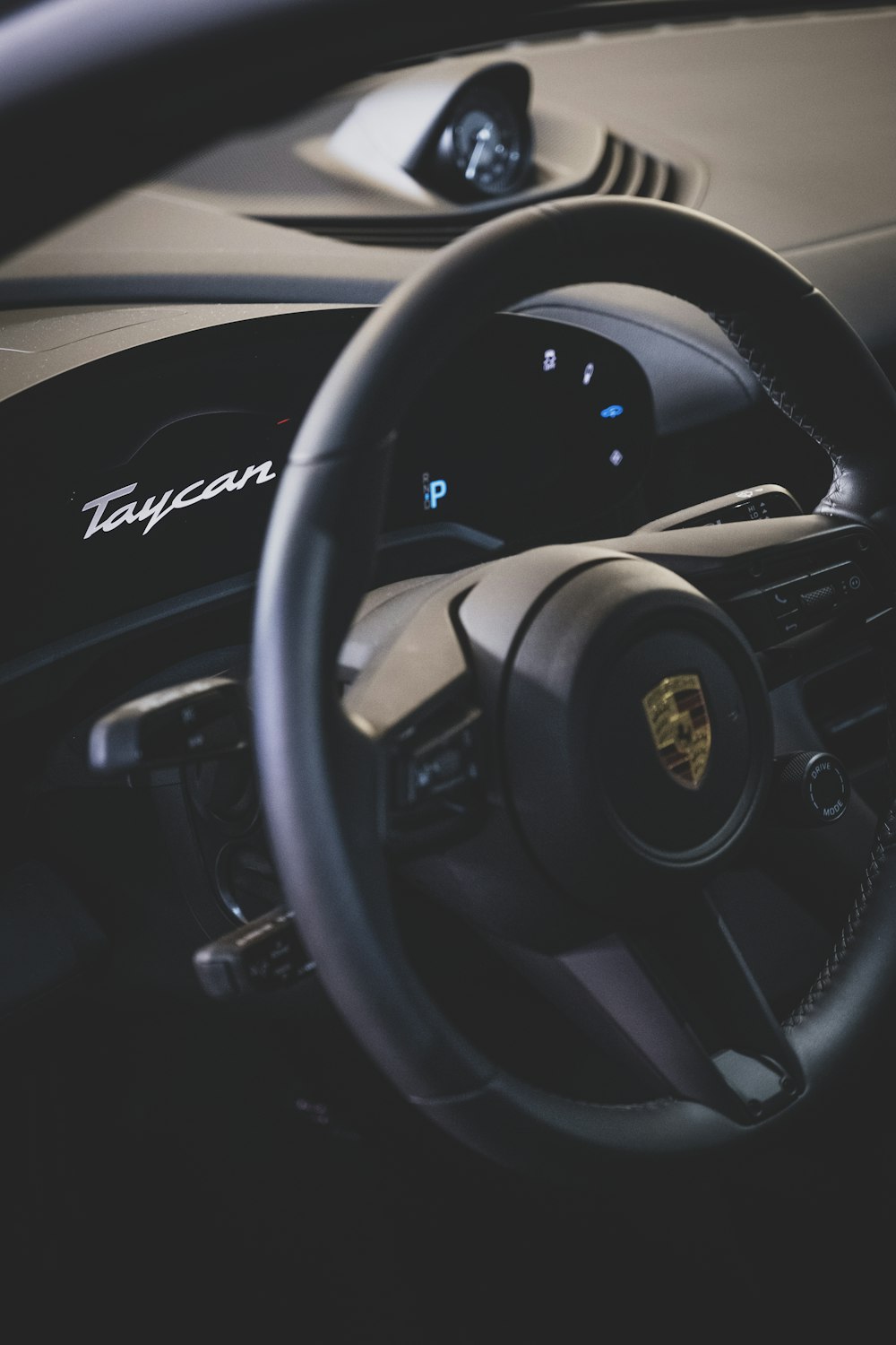 a steering wheel and dashboard of a car