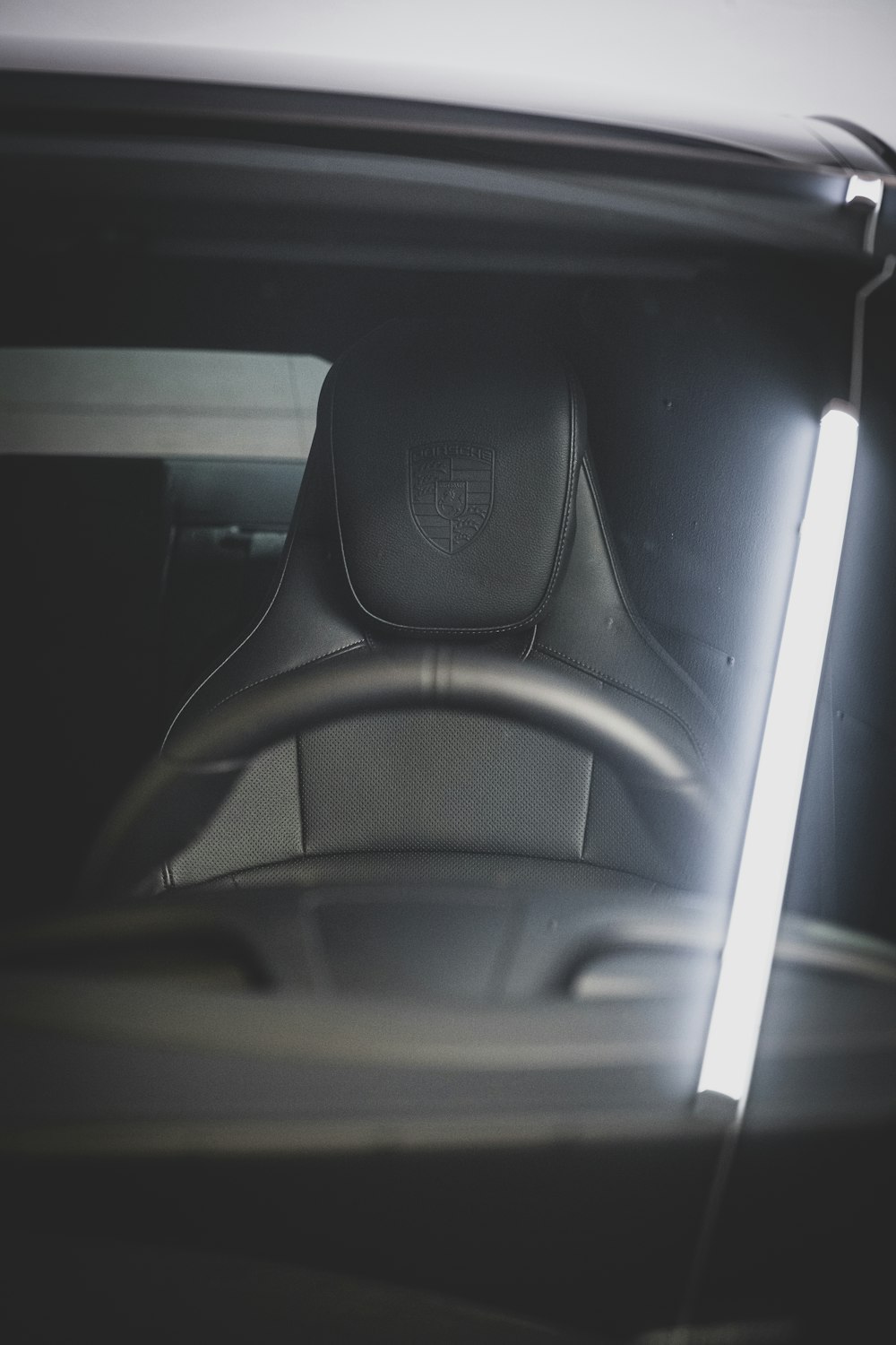 the interior of a car with the lights on