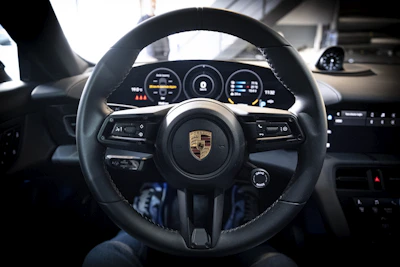 a steering wheel and dashboard of a car