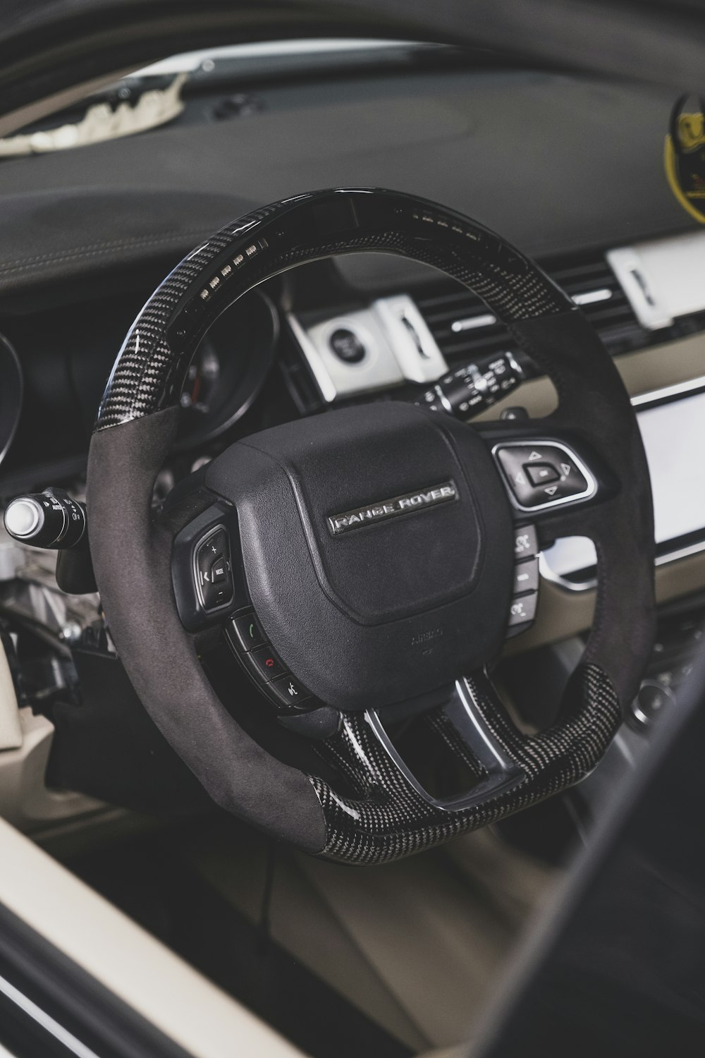 the interior of a car with a steering wheel