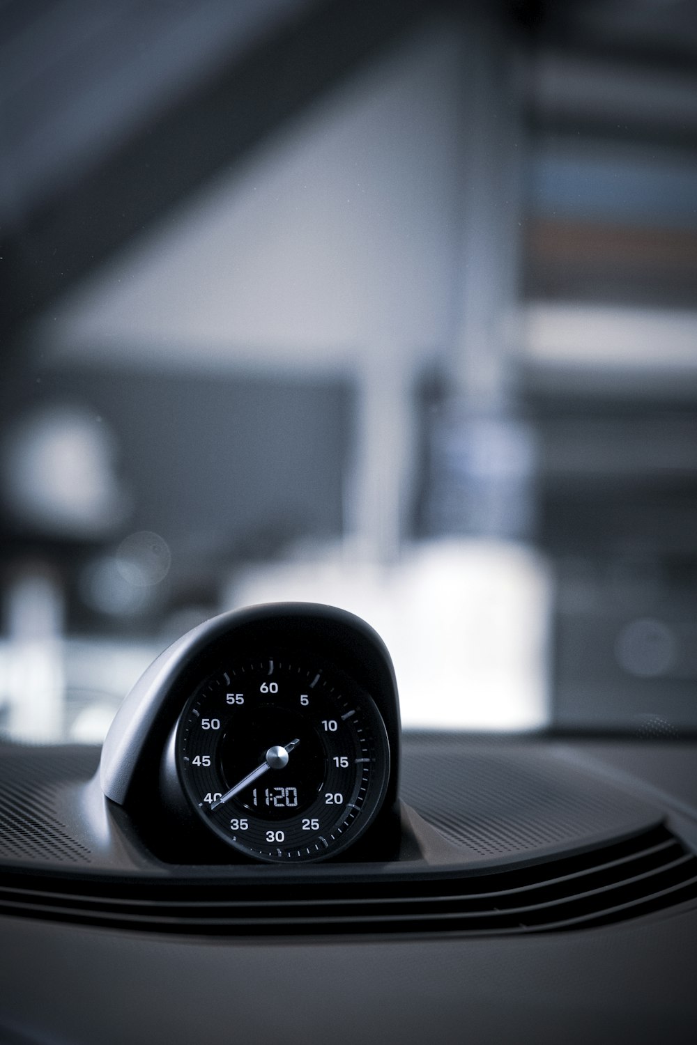 a clock sitting on top of a table