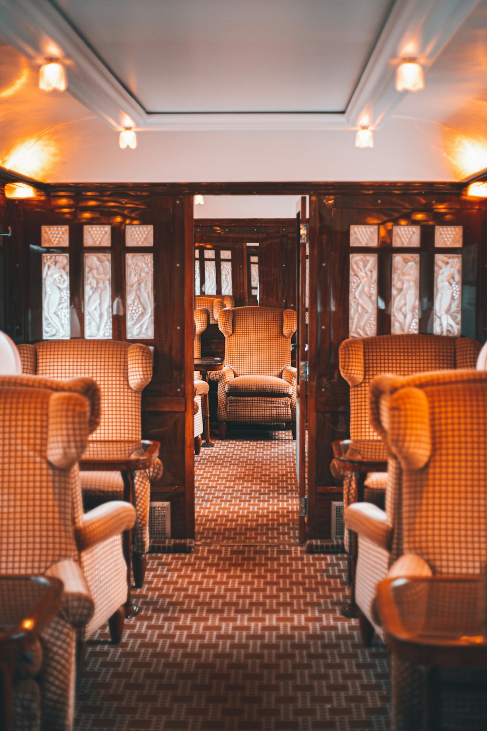 a train car filled with lots of wooden furniture
