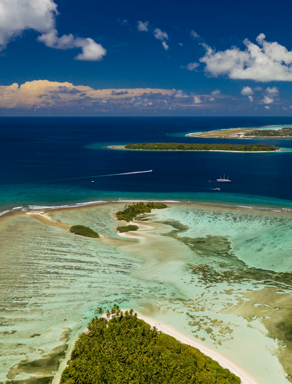 an aerial view of an island in the middle of the ocean