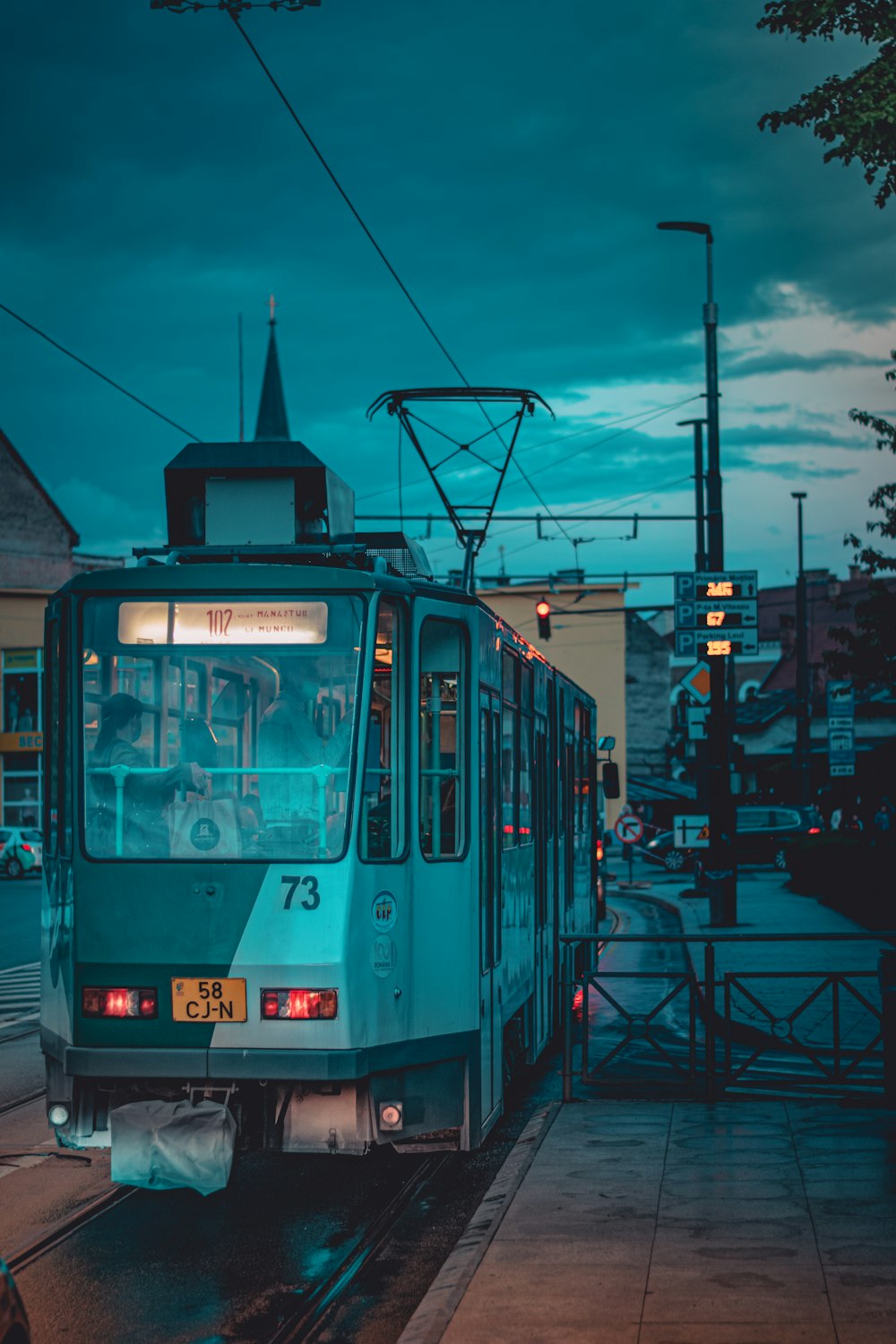 a train on a train track at night