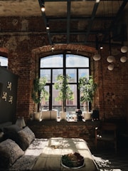Cozy boutique hotel room with rustic decor and natural light.