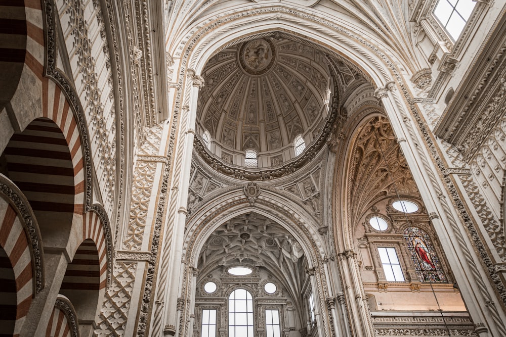 the interior of a large cathedral with high ceilings