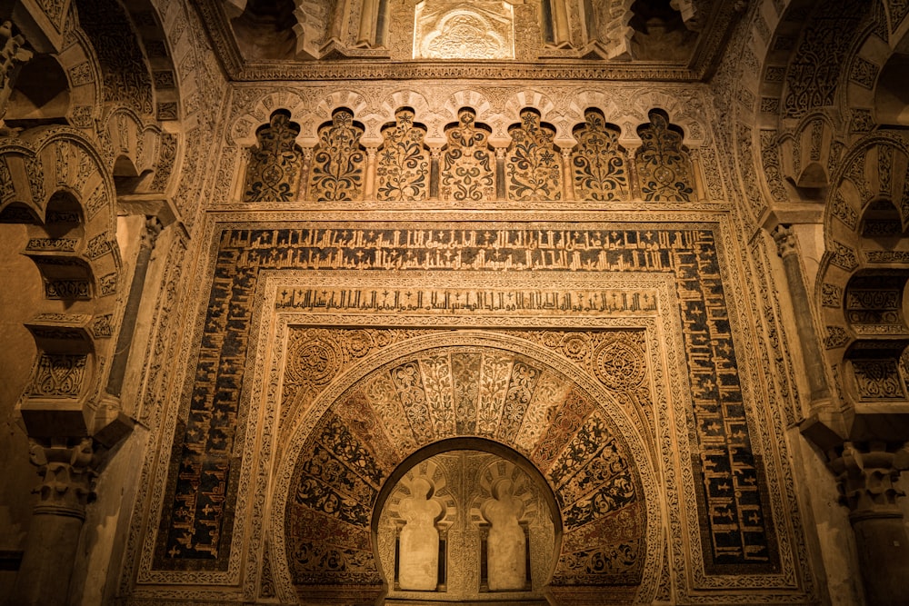 an intricately decorated wall in a building