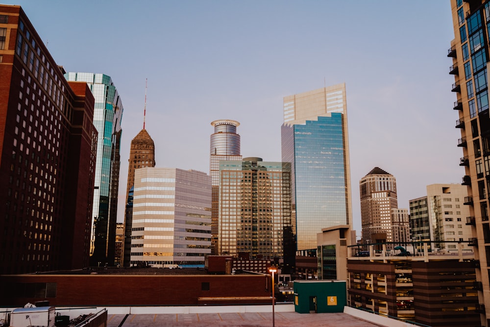 a view of a city skyline from a rooftop