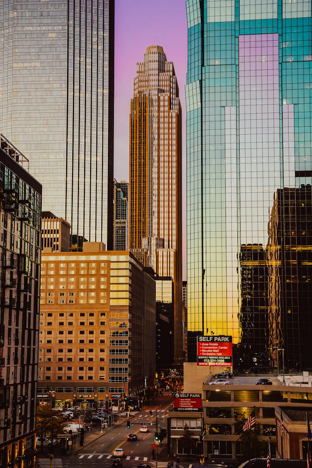 a city street filled with lots of tall buildings