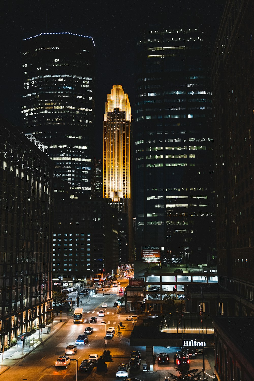 a view of a city at night from the top of a building