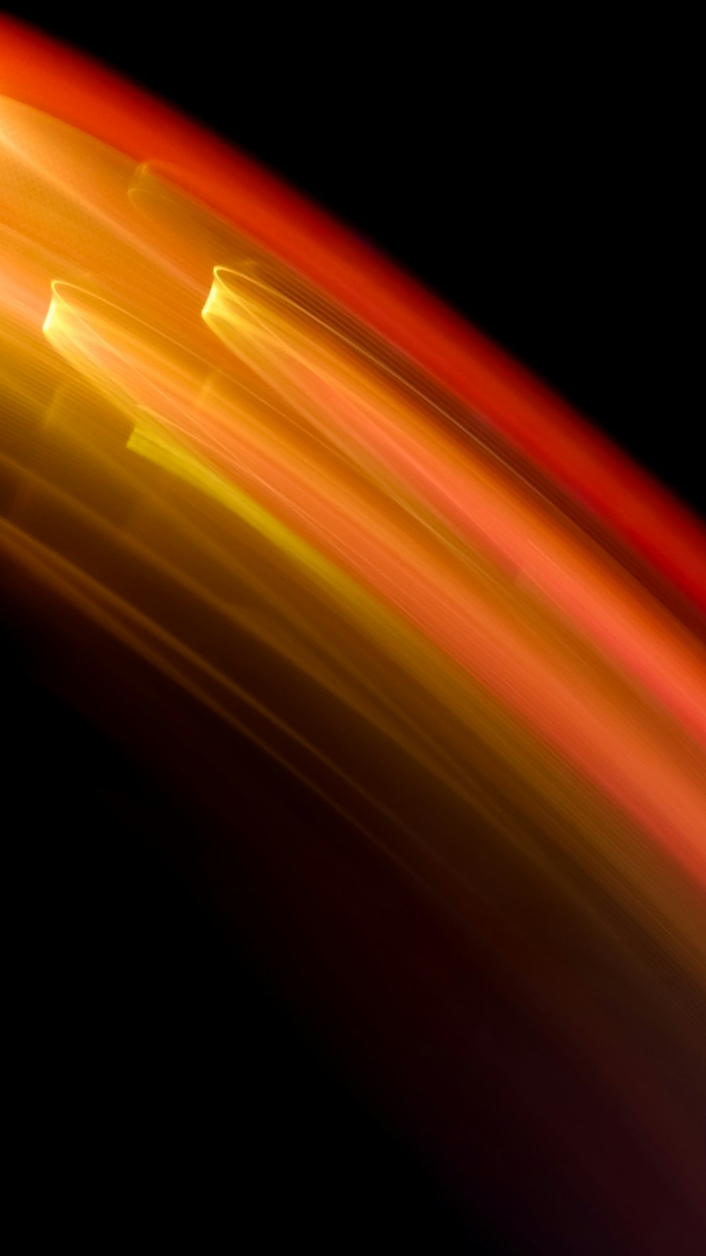 a blurry photo of a red and yellow object