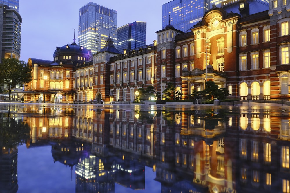 a large building that is next to a body of water