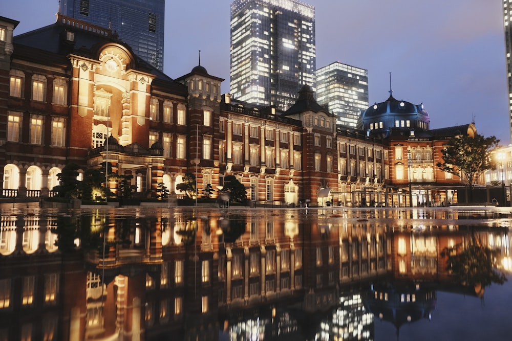 a large building that is next to a body of water