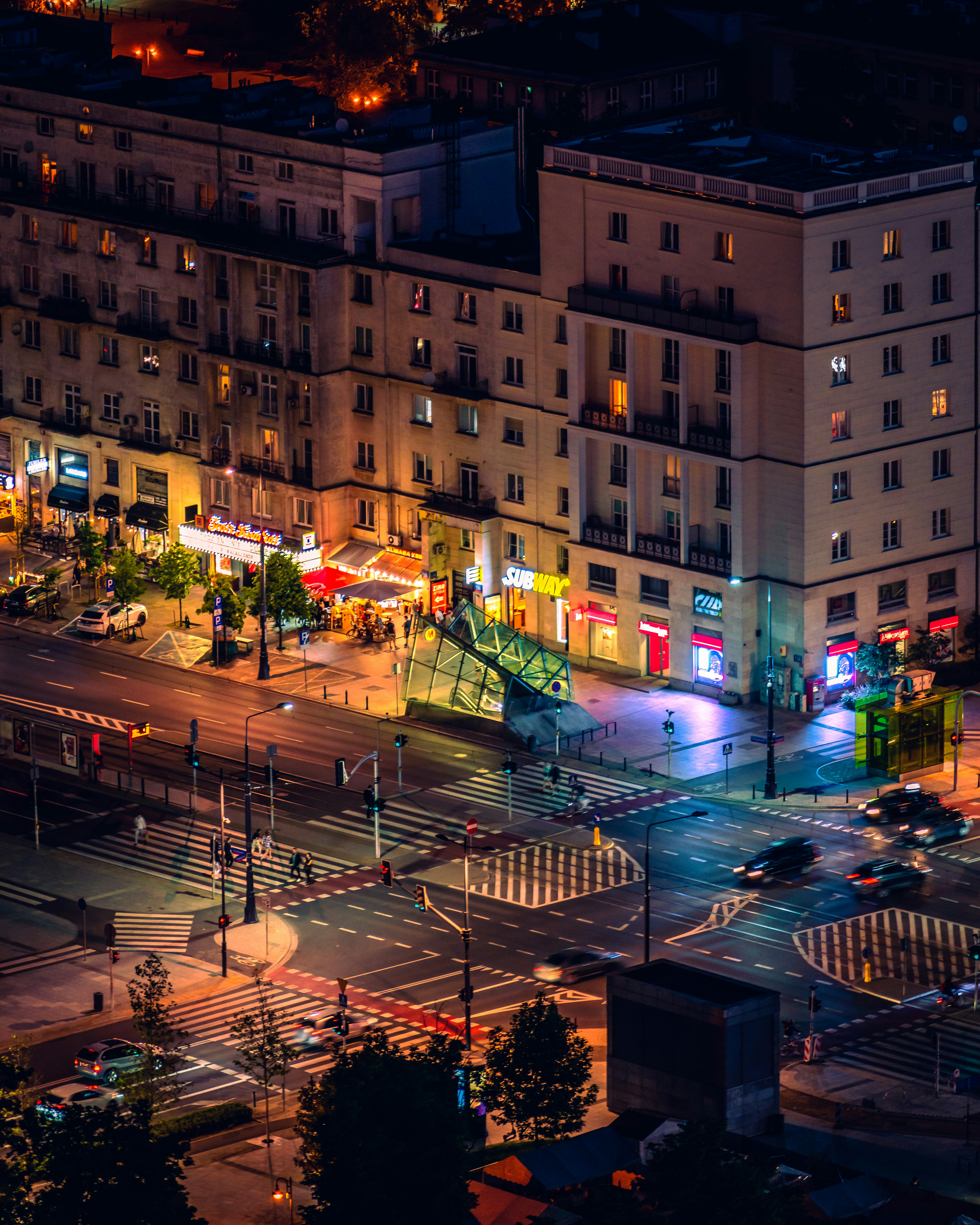 an aerial view of a city street at night