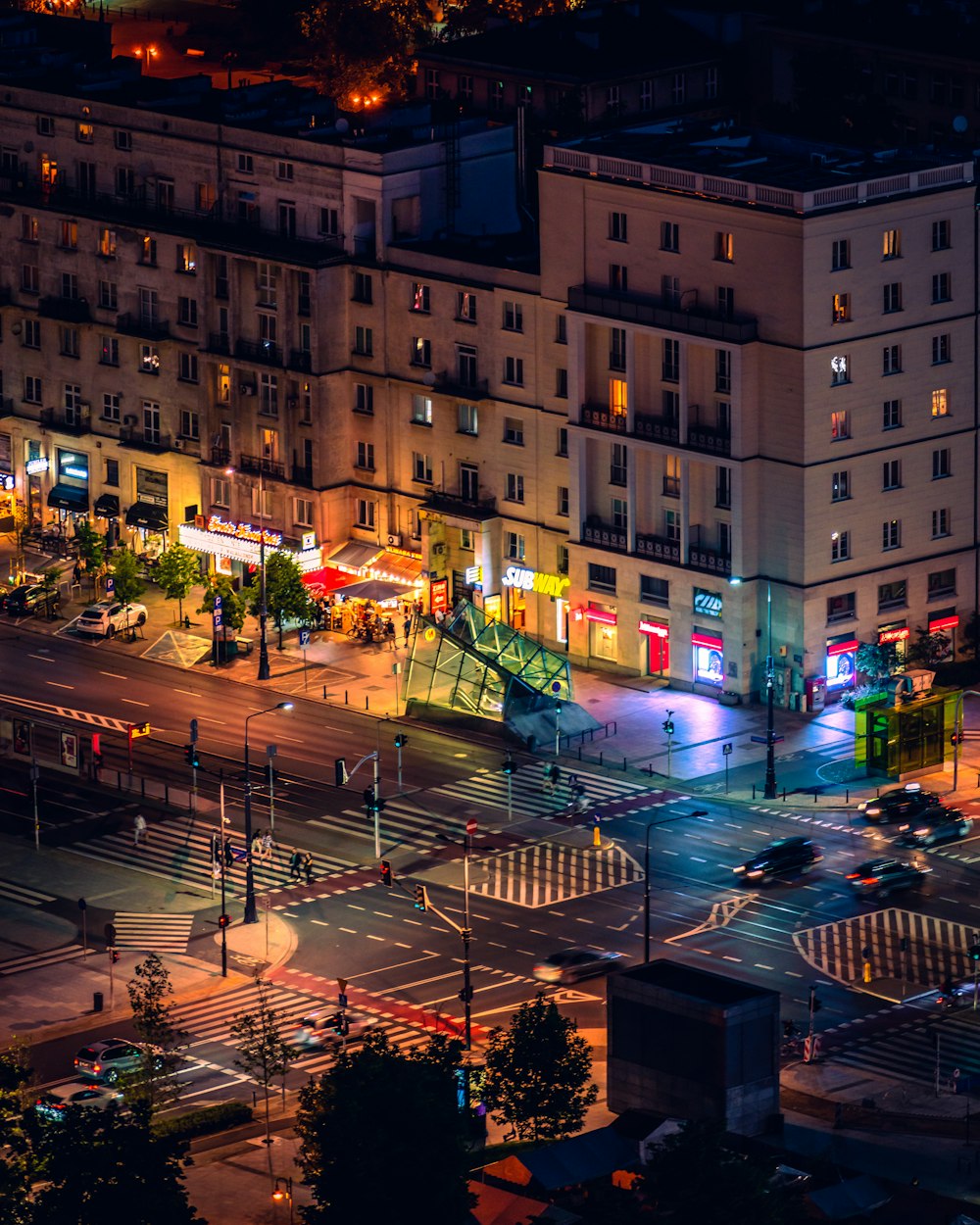 an aerial view of a city street at night