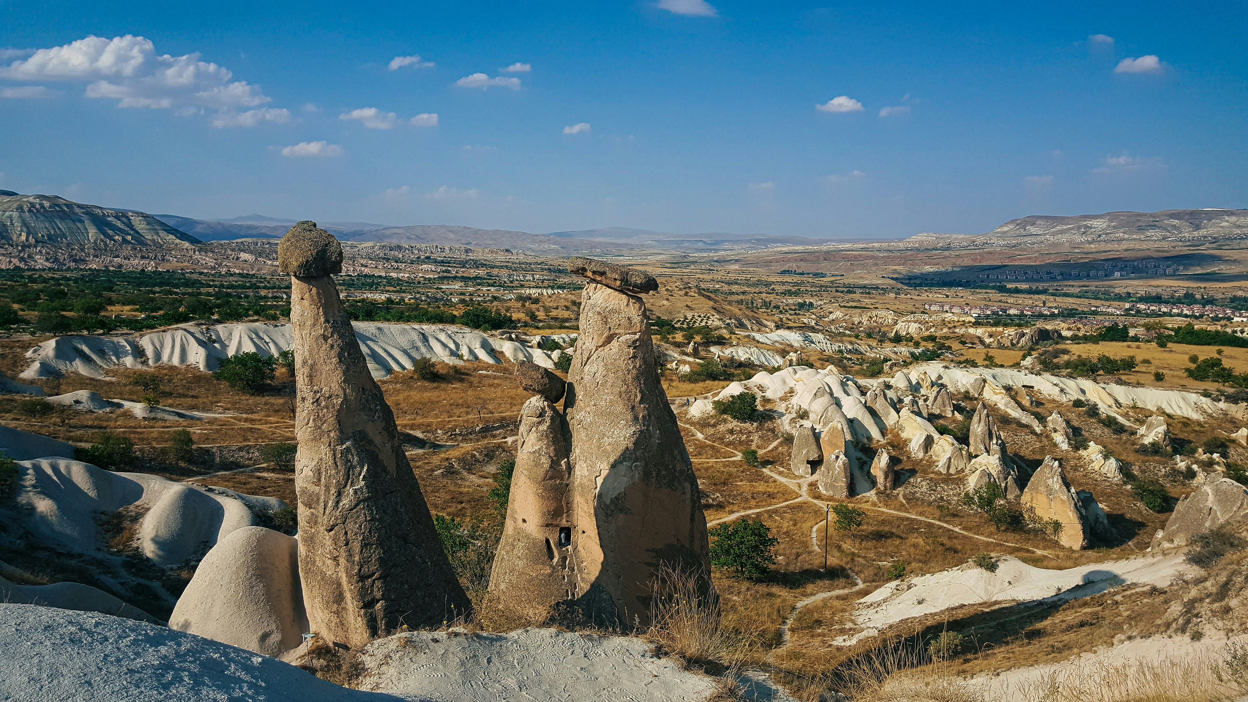 a view of the landscape from the top of a hill