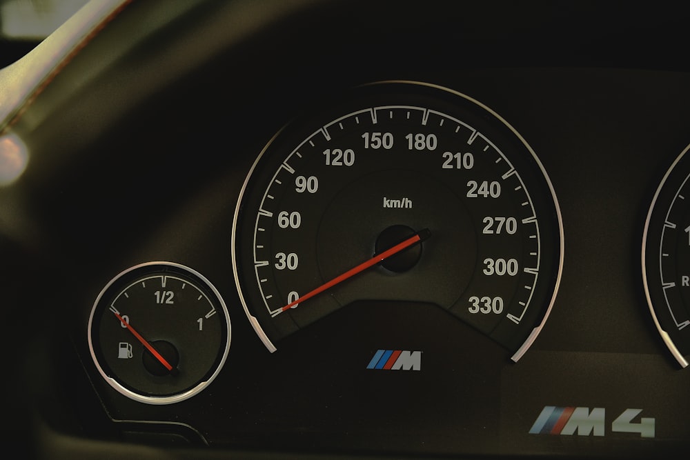 a close up of a speedometer on a car