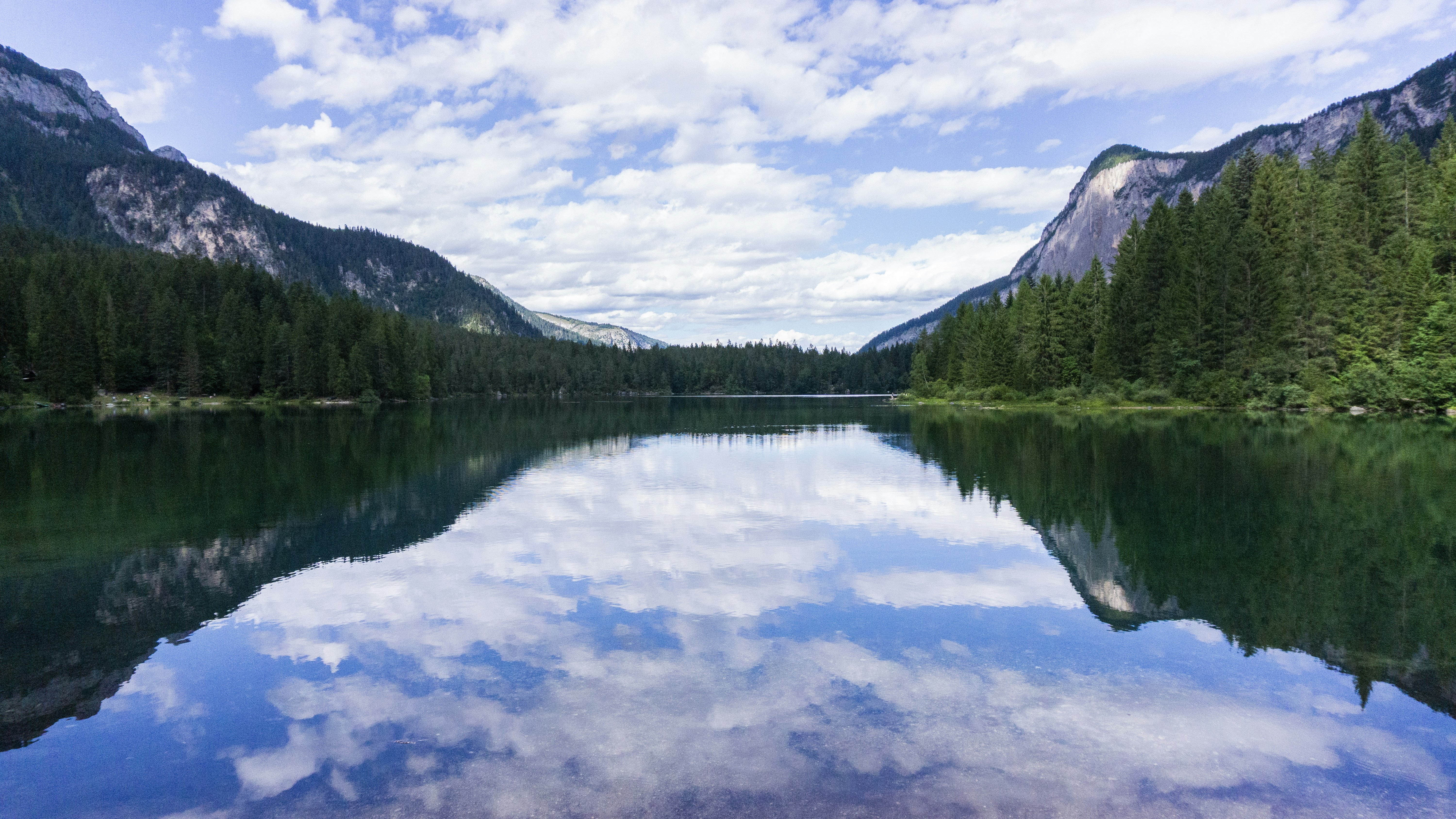 a large body of water surrounded by mountains