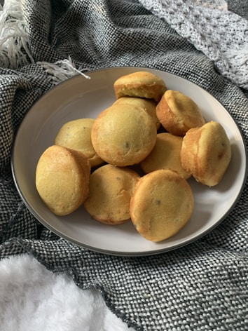 a white plate topped with cookies on top of a table