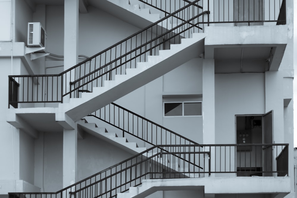 a black and white photo of a stair case