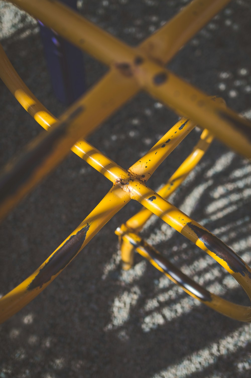 a close up of a yellow metal object