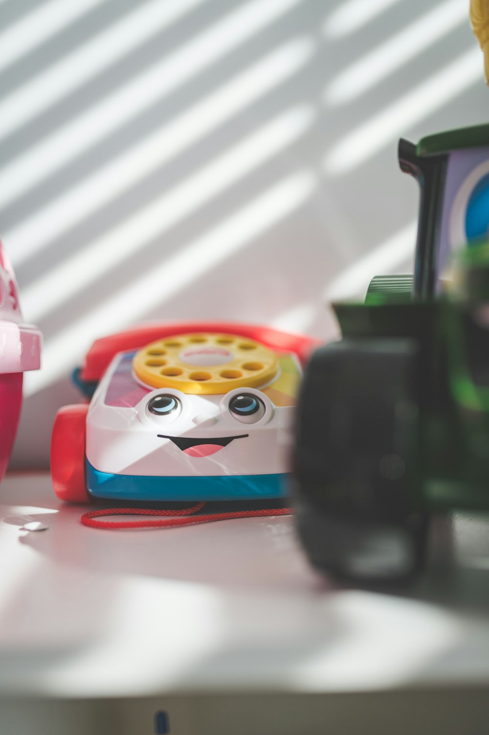 a toy phone sitting on top of a table