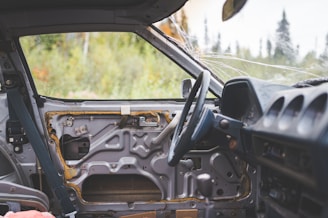 the inside of a vehicle with the door open