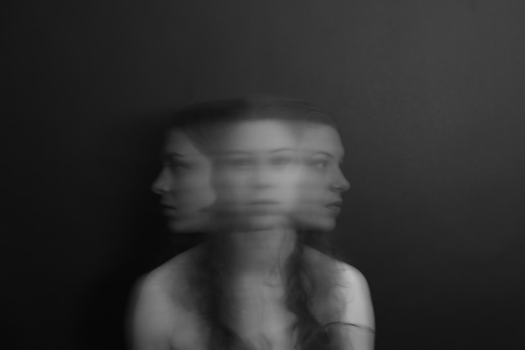 a blurry photo of a woman's face