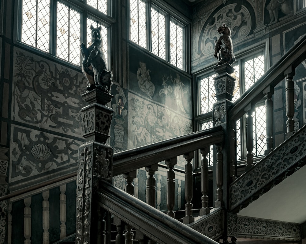 a staircase in a building with many windows