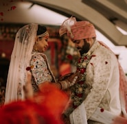 a man and a woman standing next to each other