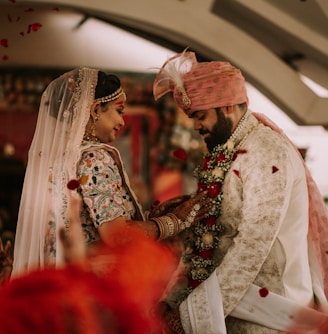 a man and a woman standing next to each other