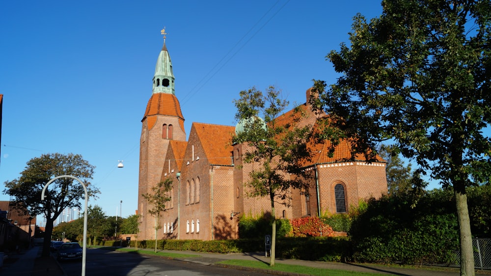 a church with a steeple and a clock tower